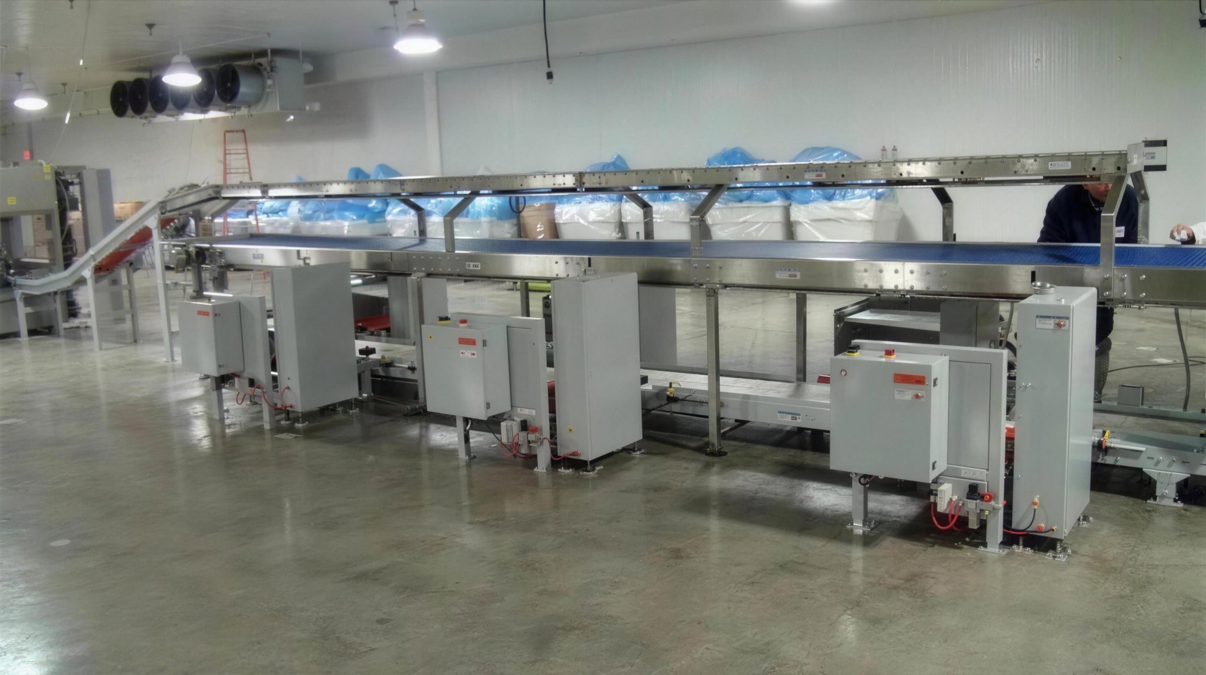 Packaging equipment and pack stations