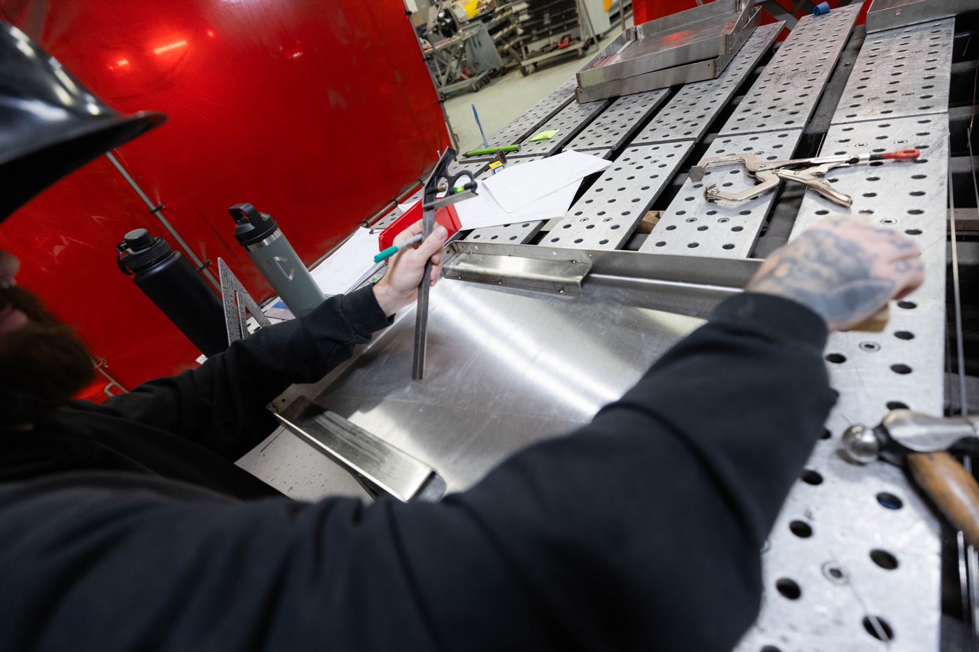Fabrication work on a stainless part at the STI weld table